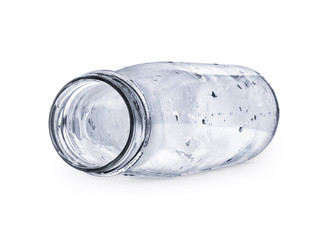 Empty glass bottle isolated on a white