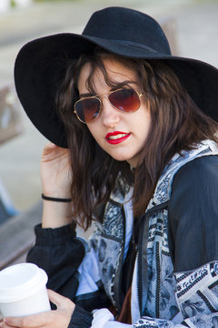 hipster girl with hat and sunglasses