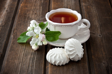 Composition with tea cup and sweet cookies