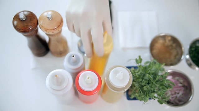 A chef is using ingredients to cook meals