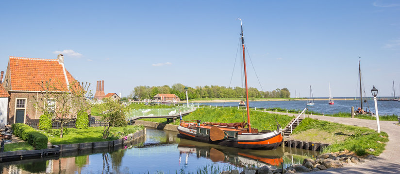 Panorama of a sailing ship at a dike in Enkhuizen