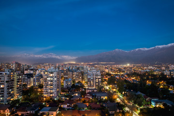 Fototapeta premium Great aerial view of Santiago de Chile with the Andes Mountains at the background