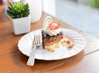 Cheesecake with chocolate with fresh strawberry