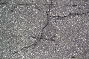 Obraz premium Asphalt texture with cracks
