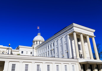Fototapeta na wymiar Alabama State Capitol Rear Angle: Rear angle perspective of the Alabama State Capitol with its grand columnal owning.