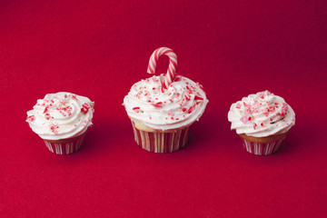three red velvet cupcakes