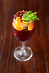 wine cocktail with mint garnish.