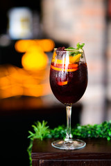 wine cocktail with mint garnish.