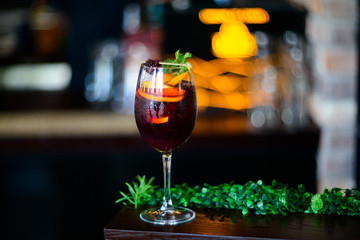 wine cocktail with mint garnish.