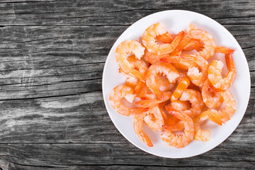 boiled tails of king shrimps on a white dish