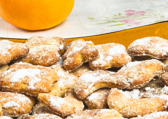 homemade cookies in powdered sugar