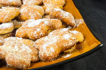 homemade cookies in powdered sugar
