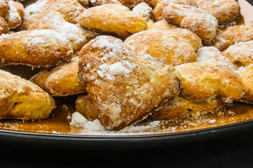 homemade cookies in powdered sugar