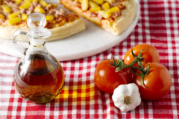 tomatoes, garlic and seasoning with hawaiian pizza