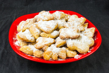 homemade cookies in powdered sugar
