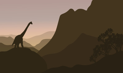 brachiosaurus in hills silhouette scenery