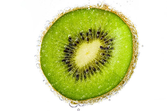 Kiwi,Slices of kiwi fruit and bubble on white background