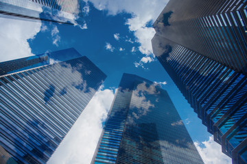 Sky and clouds reflection in skyscrappers