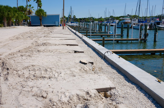 Marina dock breakwall and parking lot construction