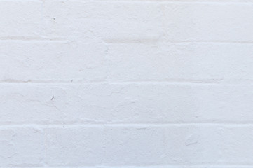Imperfect exterior white painted brick wall background