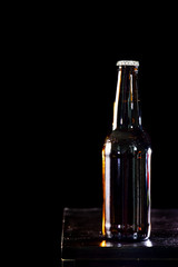Bottles of beer on black  background