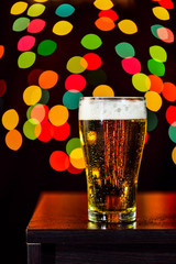 Still life, Glass of beer getting cool on bokeh  background