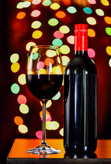 Still life, Red wine with glass and bokeh background, lowkey