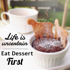 Inspirational quote on blurred chocolate cake background.