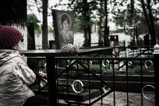 little girl near the grave