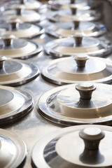 Rows Of Lids On Ice Cream Containers