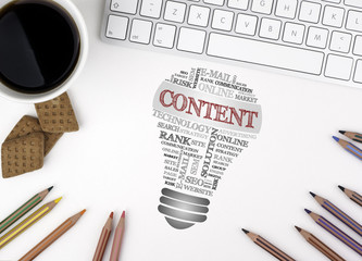 CONTENT bulb word cloud. White office desk