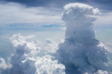 Above the clouds.Aerial cloudscape sky in stratosphere shot from airplane window
