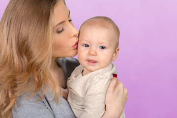Happy young mother and her son