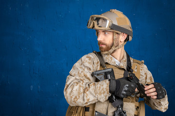 Fototapeta premium Modern soldier with gun