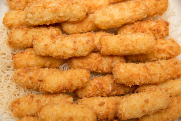  Fish fingers on the white plate