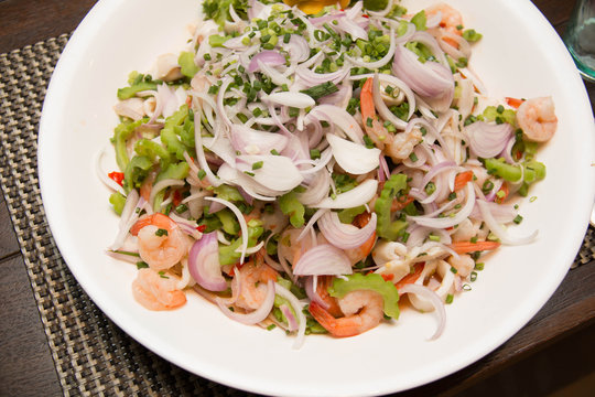  shrimp and vegetables on white dish