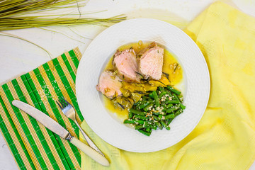 Meat in a spicy sauce of peaches