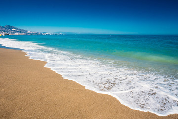 Soft Sea Ocean Waves Wash Over Golden Sand Background