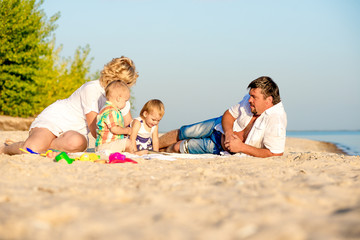 Happy family on the beach