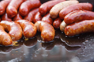 Street food. Sausages fried