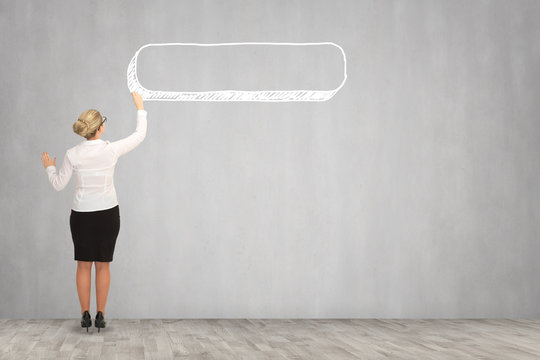 Business woman drawing on the wall. business concept
