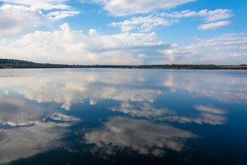 Reflection of clouds in water.