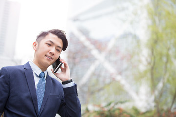 Businessman talking on smart phone