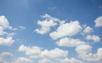 Fototapeta na wymiar blue sky background is covered by white clouds
