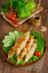 Kebab with tomatoes and cheese in pastry