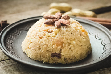 semolina halva, halvah, halava sweet desert with raisiins and nuts