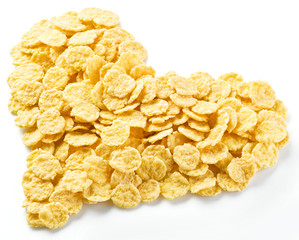 Cornflakes arranged in the shape of heart.