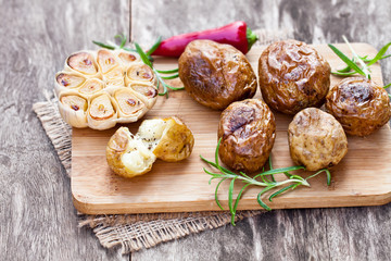 Delicious  baked potato and garlic with chillie and rosemary