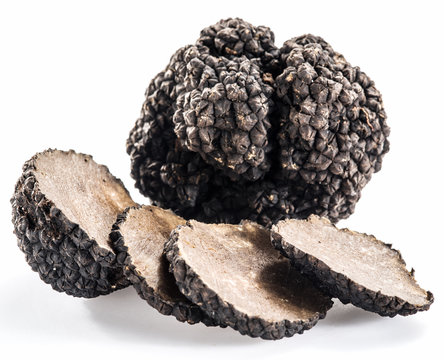 Black truffles isolated on a white background.
