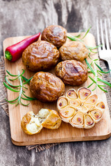 Delicious  baked potato and garlic with chillie and rosemary